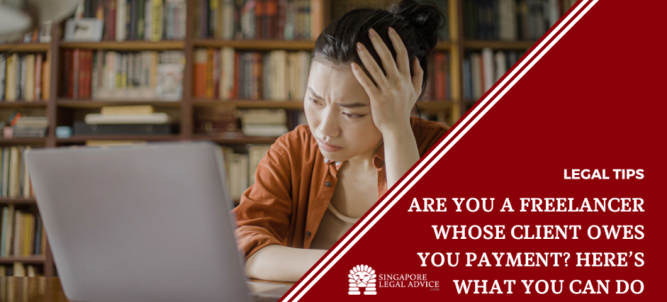 Woman frustrated while looking at computer