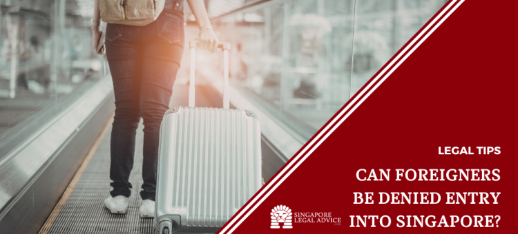 Traveling through airport with luggage on escalator